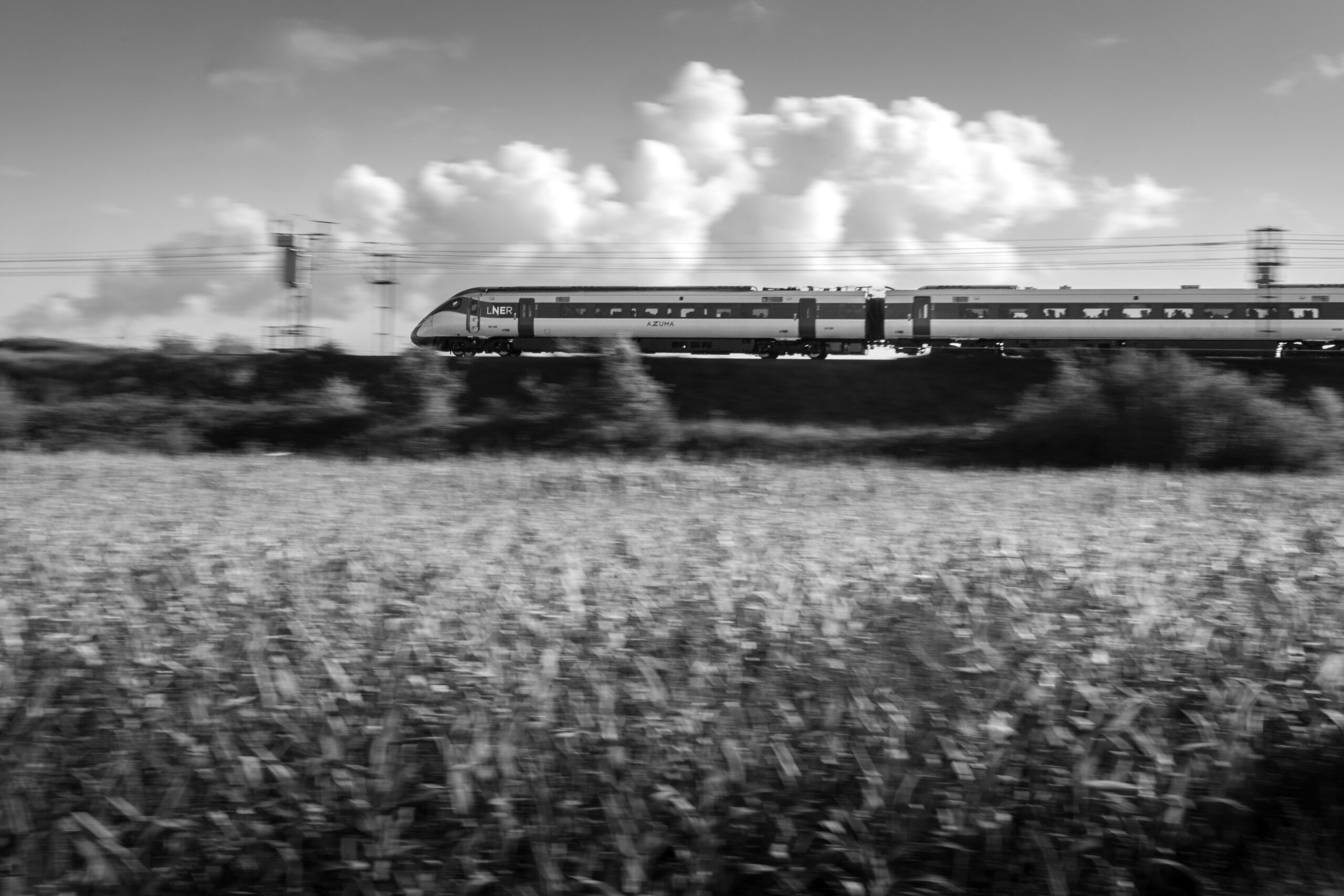 Monochrome LNER Azuma East Coast Main Line at creative railway photography technique speed Panning