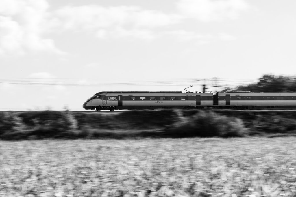 Monochrome LNER Azuma East Coast Main Line at creative railway photography technique speed Panning